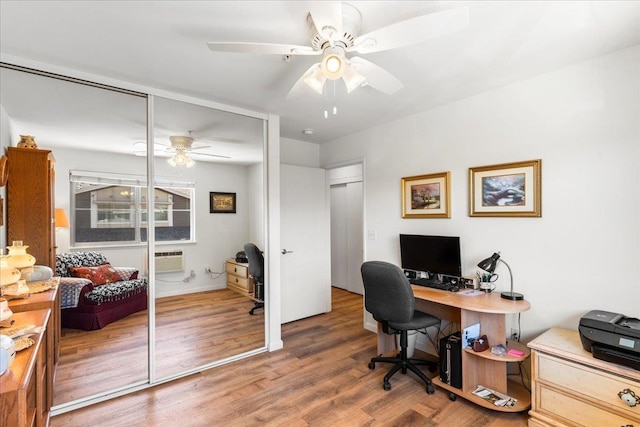 office featuring hardwood / wood-style flooring and ceiling fan