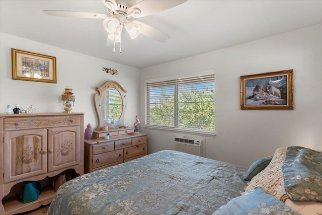 bedroom featuring ceiling fan and a wall mounted air conditioner