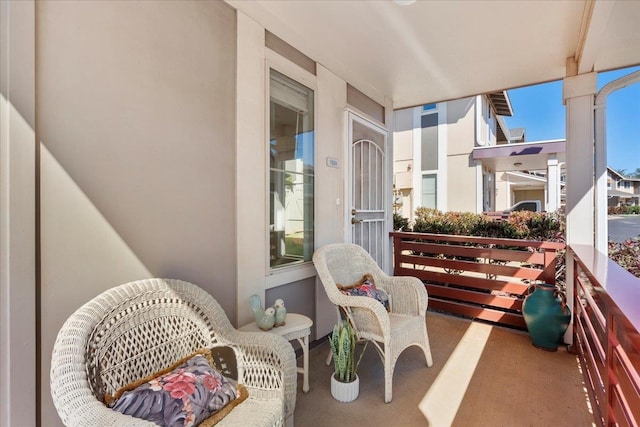 balcony featuring covered porch