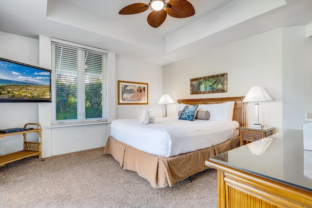 3200 Wailea Alanui Dr Unit 1505, Kihei, HI 96753 - bedroom featuring light colored carpet, a raised ceiling, and ceiling fan