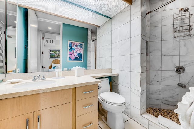 bathroom with walk in shower, vanity, toilet, and tile walls