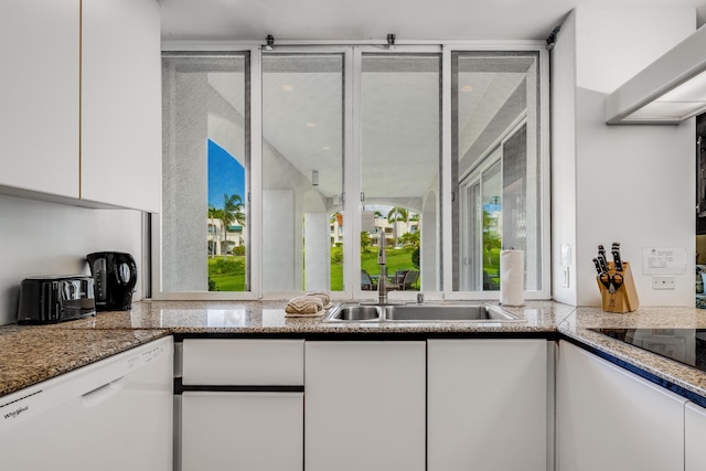 3200 Wailea Alanui Dr Unit 1505, Kihei, HI 96753 - kitchen featuring white dishwasher, white cabinetry, black electric stovetop, and healthy amount of natural light