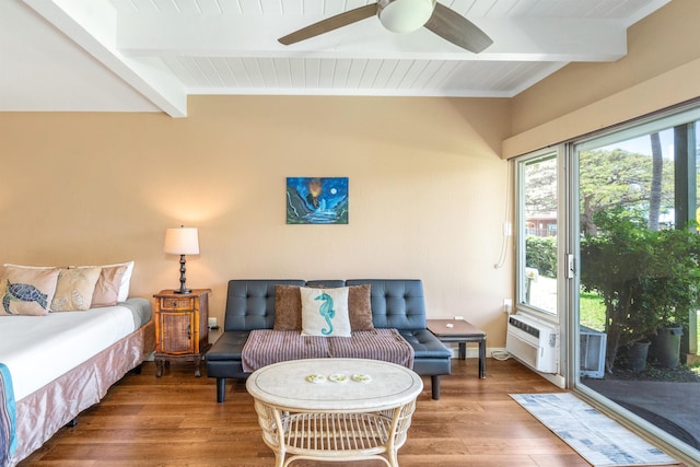 interior space featuring hardwood / wood-style floors, ceiling fan, and beam ceiling