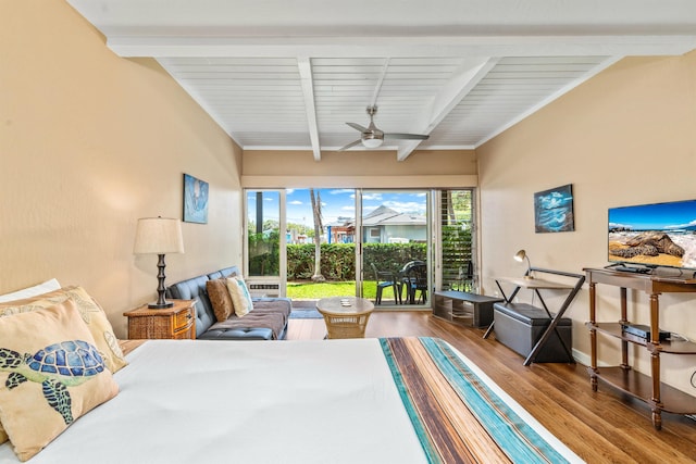 bedroom featuring beamed ceiling, ceiling fan, hardwood / wood-style flooring, and access to outside