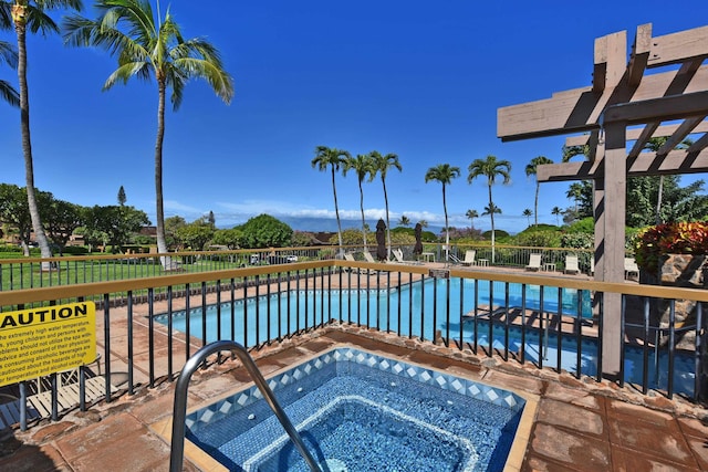 view of pool featuring a community hot tub and a pergola