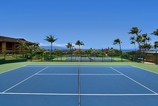 view of sport court featuring basketball hoop