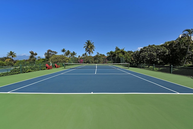 view of sport court featuring basketball hoop