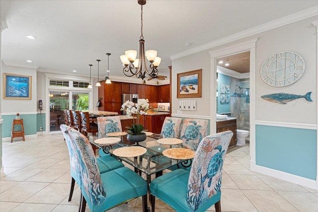 440 Mikioi Pl, Kihei, HI 96753 - dining room with light tile patterned floors, ornamental molding, recessed lighting, baseboards, and a chandelier