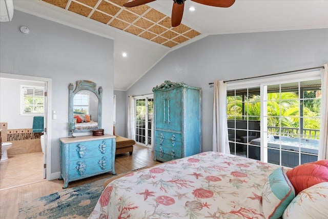 440 Mikioi Pl, Kihei, HI 96753 - bedroom featuring vaulted ceiling, access to outside, wood finished floors, ensuite bath, and ceiling fan