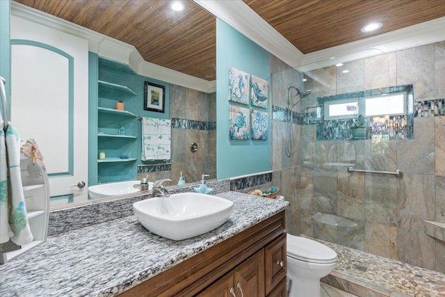 bathroom with a tile shower, wooden ceiling, toilet, ornamental molding, and vanity