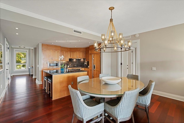 dining room featuring recessed lighting, dark wood finished floors, visible vents, and baseboards