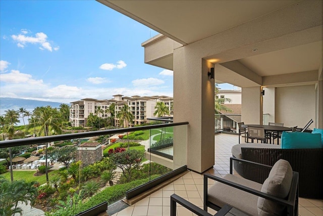 balcony with outdoor dining area