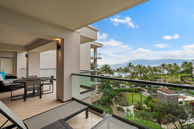 balcony featuring a mountain view