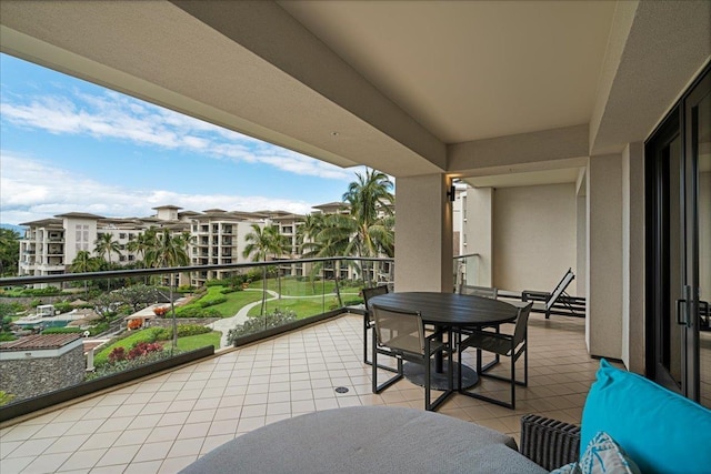 balcony with outdoor dining area