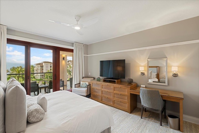 bedroom with access to outside, baseboards, and a ceiling fan