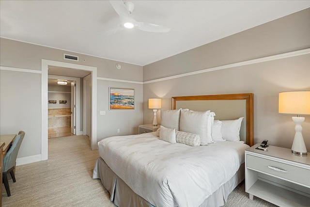 bedroom with baseboards, visible vents, a ceiling fan, and light colored carpet