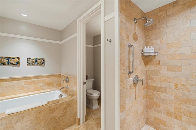 full bath with toilet, a garden tub, tile patterned flooring, and tiled shower