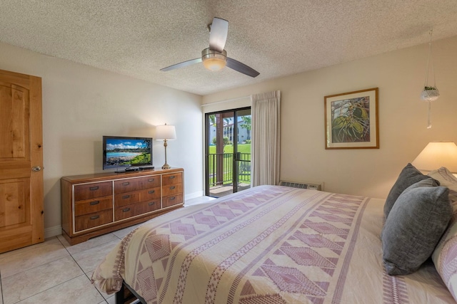 tiled bedroom with a textured ceiling, access to exterior, and ceiling fan