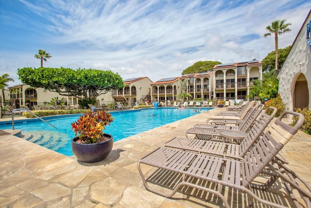 view of pool featuring a patio area