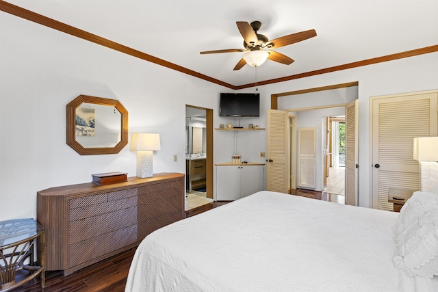 bedroom with ornamental molding, ensuite bath, ceiling fan, and dark wood-type flooring