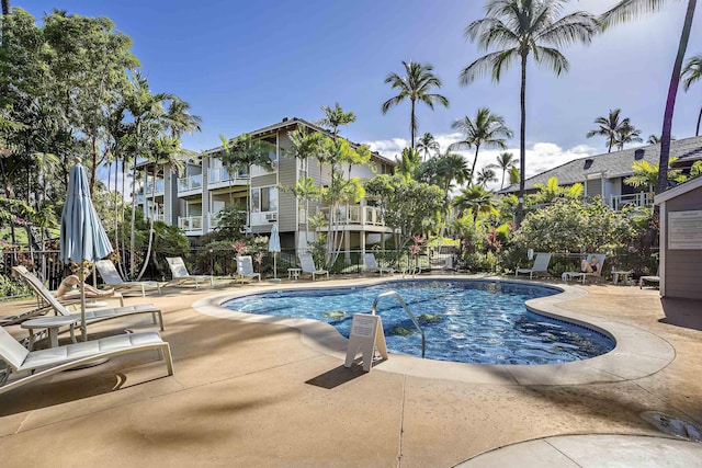 view of swimming pool featuring a patio area