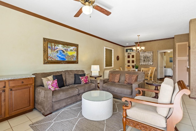 living room featuring crown molding, light tile patterned flooring, and ceiling fan with notable chandelier