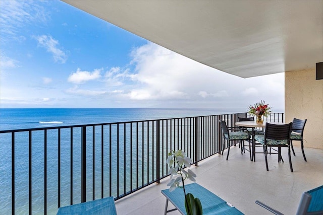 balcony featuring a water view
