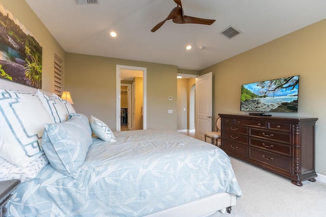 2563 Umeke Cir Unit 64, Kihei, HI 96753 - bedroom with recessed lighting, light colored carpet, ceiling fan, arched walkways, and baseboards