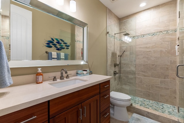 2563 Umeke Cir Unit 64, Kihei, HI 96753 - full bathroom featuring vanity, toilet, a shower stall, and recessed lighting