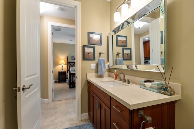 2563 Umeke Cir Unit 64, Kihei, HI 96753 - bathroom with vanity and baseboards