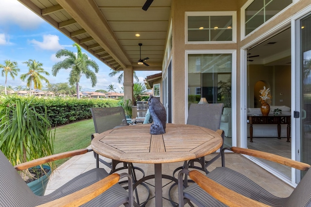 2563 Umeke Cir Unit 64, Kihei, HI 96753 - wooden deck with a ceiling fan, outdoor dining space, and a yard