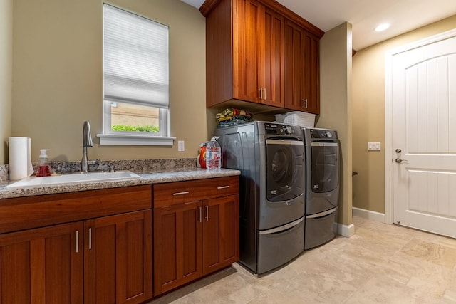 2563 Umeke Cir Unit 64, Kihei, HI 96753 - laundry area featuring washer and clothes dryer, cabinet space, and baseboards