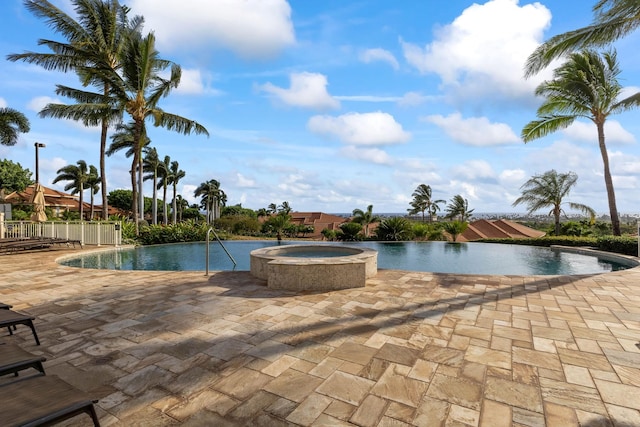 2563 Umeke Cir Unit 64, Kihei, HI 96753 - swimming pool with an in-ground hot tub and a patio