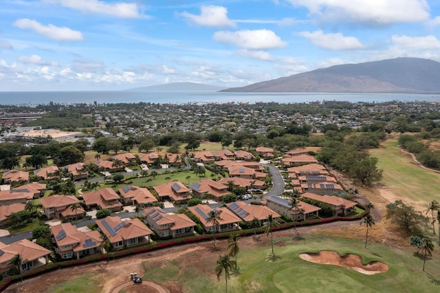 2563 Umeke Cir Unit 64, Kihei, HI 96753 - aerial view of property and surrounding area featuring a water and mountain view, nearby suburban area, and a local golf course