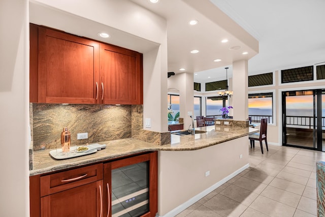 bar with beverage cooler, indoor wet bar, recessed lighting, tasteful backsplash, and light tile patterned floors