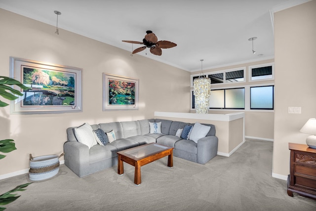 living room with carpet flooring, a ceiling fan, baseboards, and ornamental molding