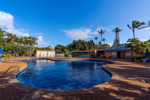 50 Kepuhi Pl Unit 128, Maunaloa, HI 96770 - pool featuring a patio and a hot tub