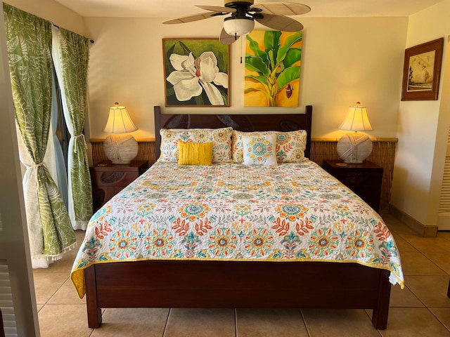 bedroom featuring tile patterned floors and ceiling fan