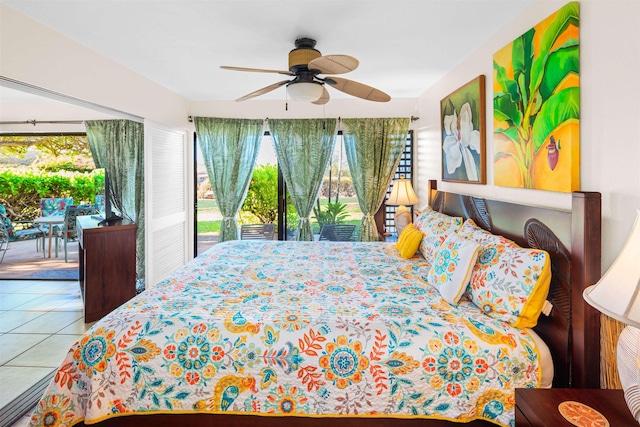 50 Kepuhi Pl Unit 128, Maunaloa, HI 96770 - tiled bedroom with a ceiling fan and access to exterior