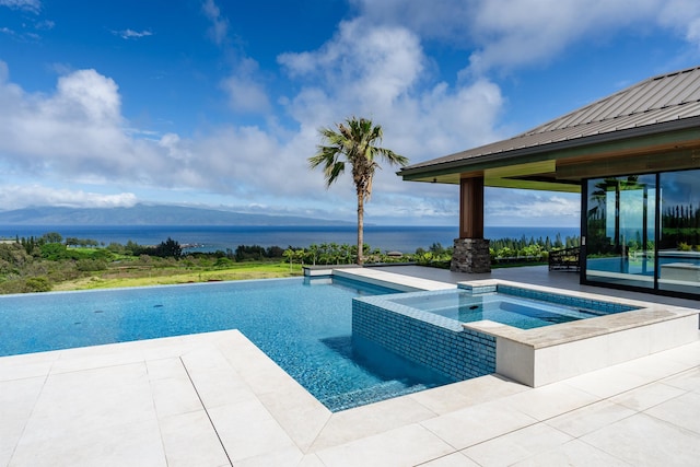 210 Naio Pl, Lahaina, HI 96761 - view of swimming pool with a water view, a pool with connected hot tub, and a patio area