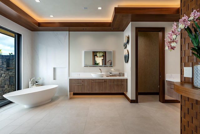 210 Naio Pl, Lahaina, HI 96761 - full bath with a freestanding tub, vanity, tile patterned floors, and a raised ceiling