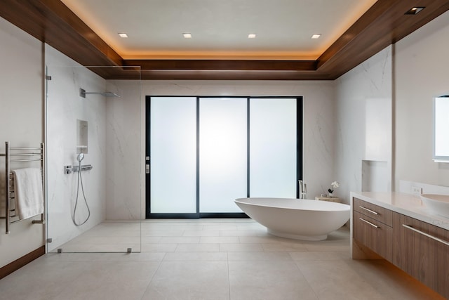 210 Naio Pl, Lahaina, HI 96761 - full bath featuring a raised ceiling, a towel warmer, vanity, a marble finish shower, and a soaking tub