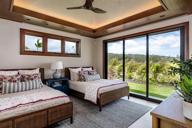 210 Naio Pl, Lahaina, HI 96761 - bedroom featuring a raised ceiling, access to exterior, and a ceiling fan
