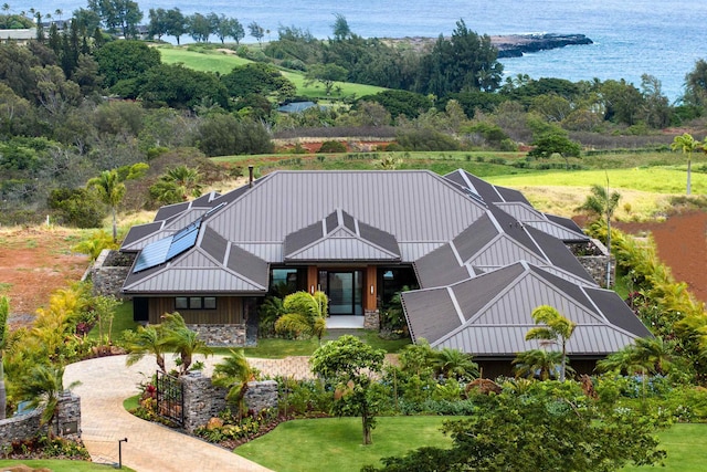 210 Naio Pl, Lahaina, HI 96761 - view of front of home with a standing seam roof, a water view, metal roof, and stone siding
