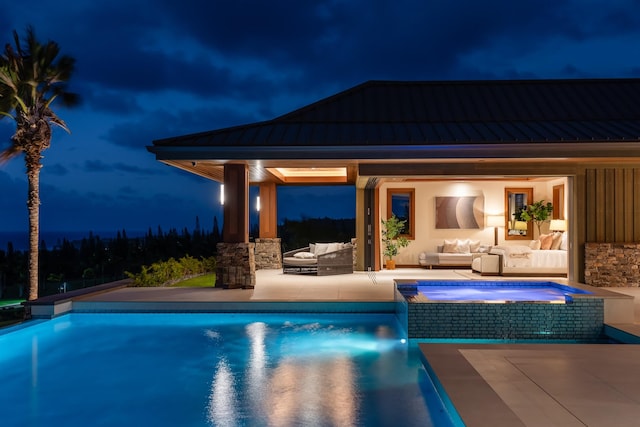 210 Naio Pl, Lahaina, HI 96761 - pool at night featuring outdoor lounge area, an outdoor pool, and a patio