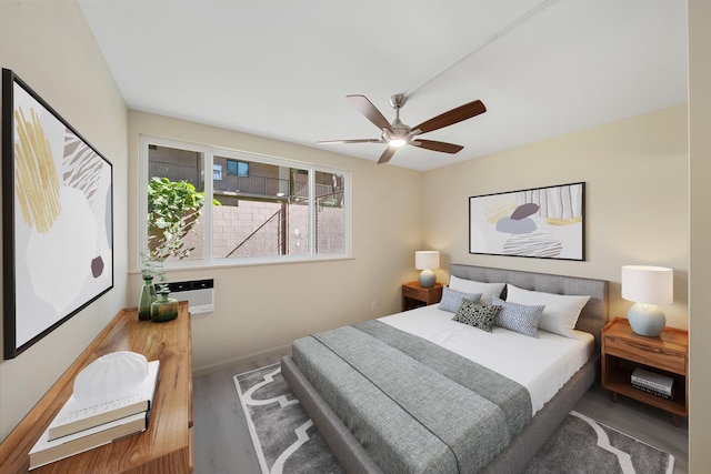 bedroom with baseboards and a ceiling fan