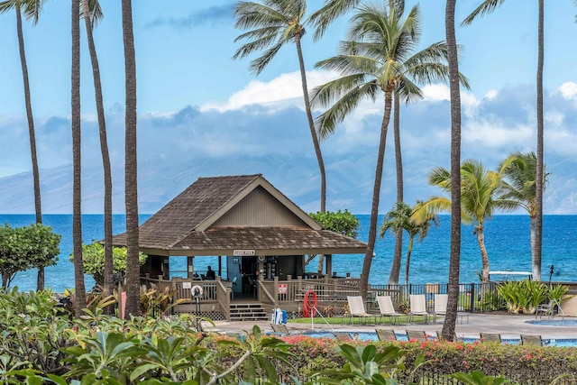 property view of water featuring a gazebo and fence