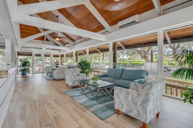 sunroom featuring a wall unit AC, plenty of natural light, lofted ceiling with beams, and wood ceiling