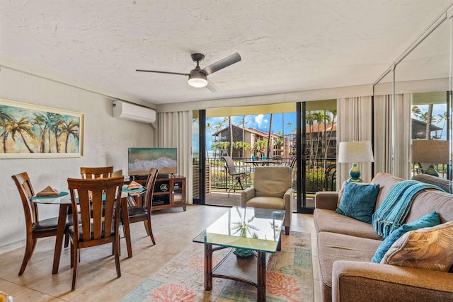 living room featuring a healthy amount of sunlight, a sunroom, expansive windows, and a wall mounted AC