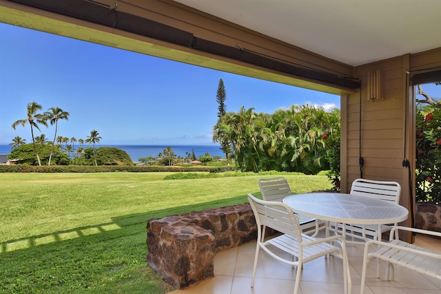 view of patio / terrace with a water view